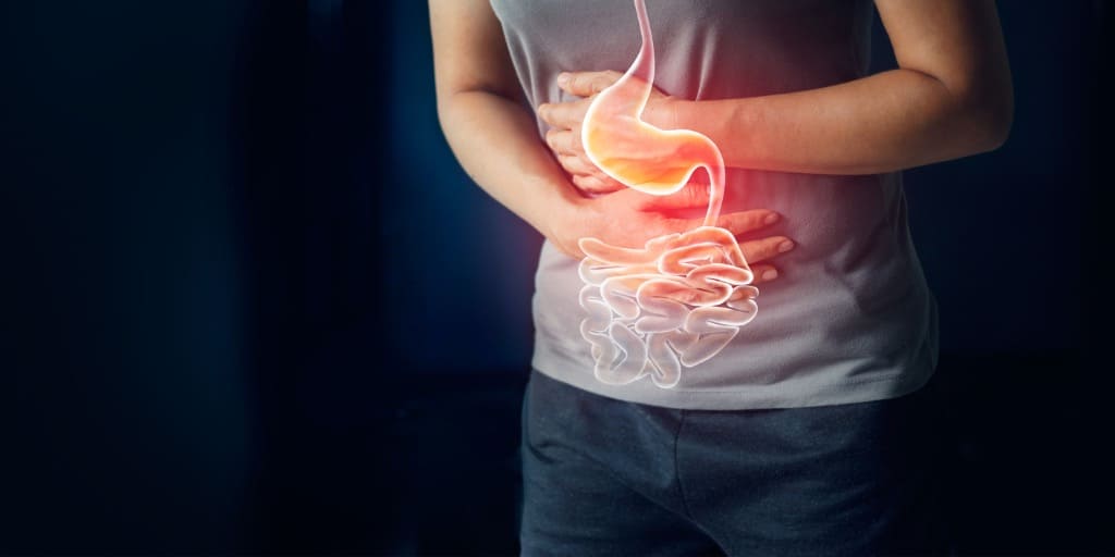 口臭の原因となる胃腸や内臓の問題を示す画像